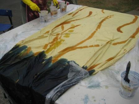 painting dye on one section of the piece