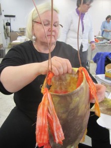 Hadijah working on her sculpture