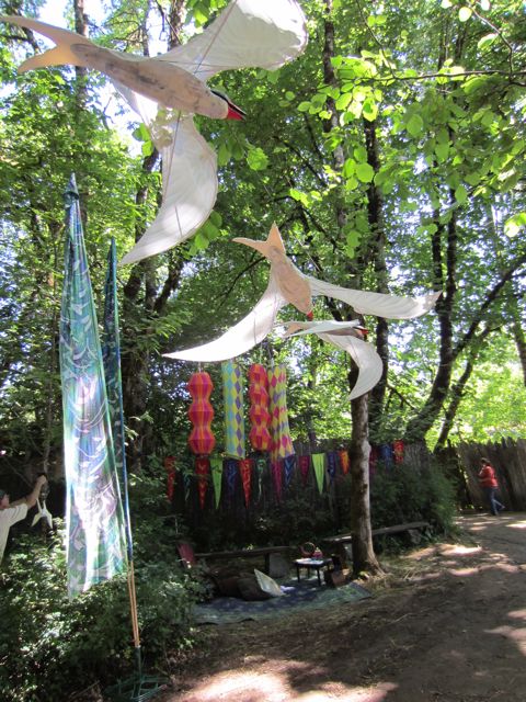 the Arctic Tern puppets flying above the path